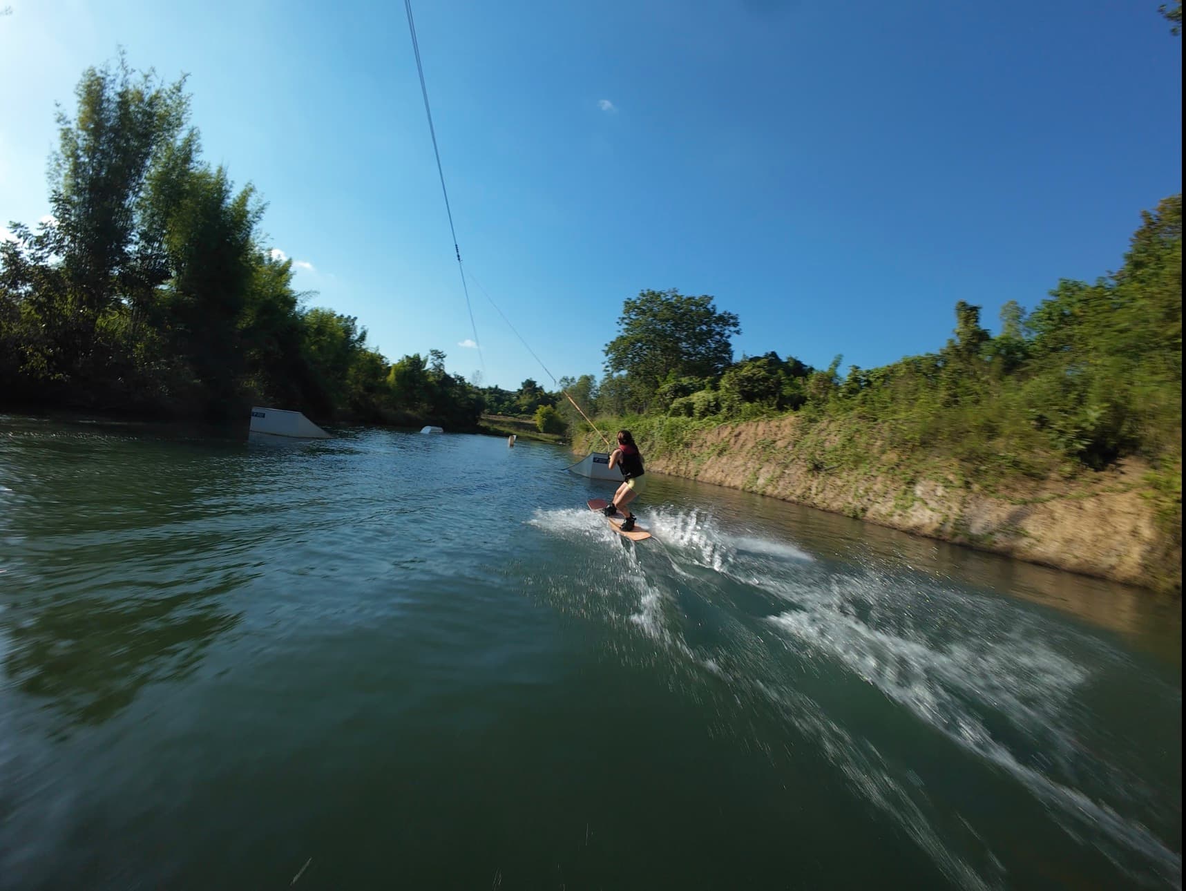 Lakehouse wakeboarding action shot 1